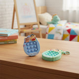 Crayon Shinchan bubble pop fidget keychain in blue and green, Jack Gifts Online Lebanon