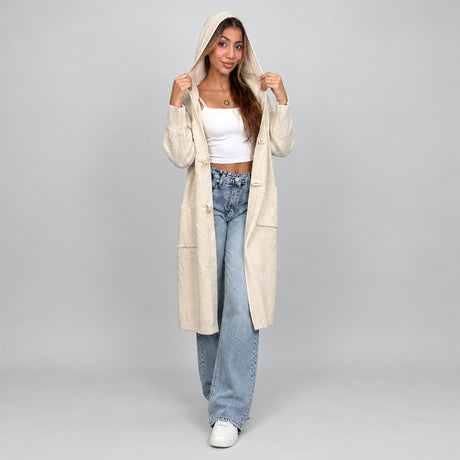 Full length cream hooded cardigan worn with the hood up