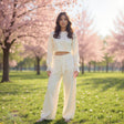 Woman in cream lace trim sweatshirt and wide leg pants set, Jack Gifts Online Lebanon