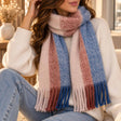 Cream blanket scarf with rust and blue stripes and long twisted tassel ends