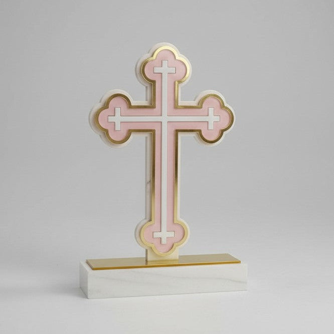Pale pink budded acrylic cross with a gold mirror outline on a white marble block