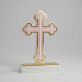Pale pink budded acrylic cross with a gold mirror outline on a white marble block