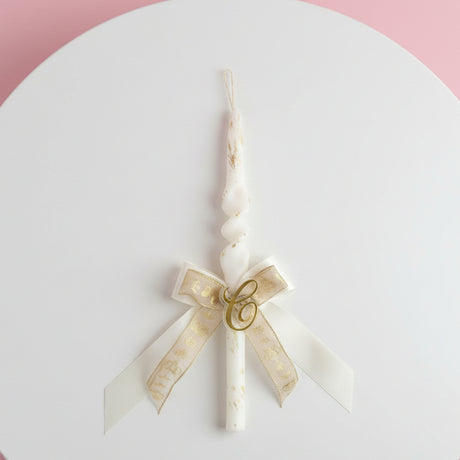 Spiral candle with a cream crown print bow and gold letter charm