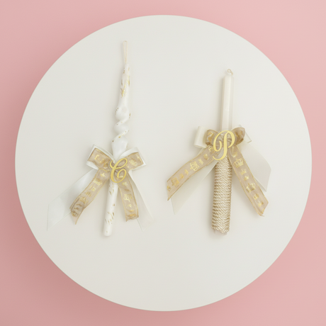 Spiral and classic candles with cream crown ribbon bows and gold letters