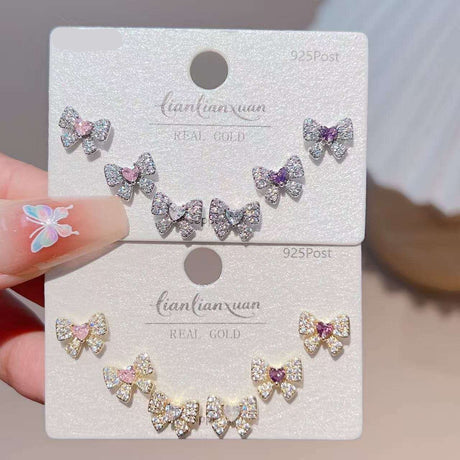 Set of three crystal bow stud earrings in gold and silver tone, Jack Gifts Online Lebanon