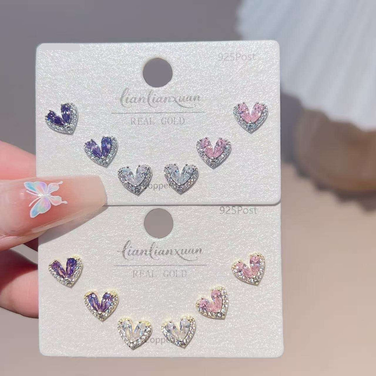 Three pairs of crystal heart stud earrings in purple, pink and clear, Jack Gifts Online Lebanon