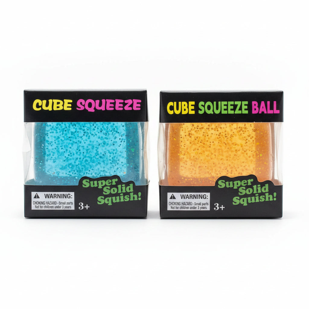 Two glitter cube squeeze sensory toys in window boxes, one sparkly blue and one sparkly orange