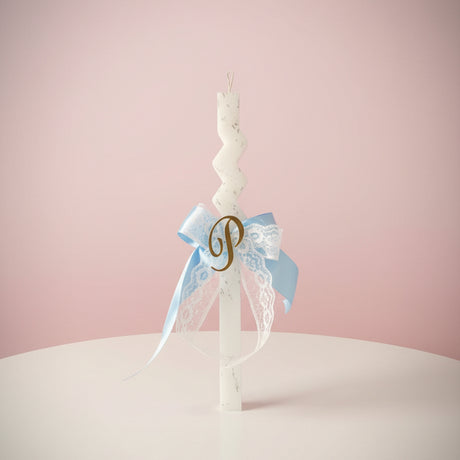 Light blue lace bow zigzag candle with a gold letter