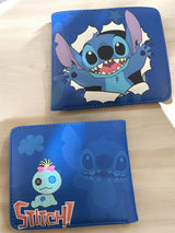 Royal blue bifold Stitch wallet laid flat beside its back panel with a Scrump doll print