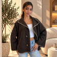 Dark brown wool jacket with contrast whipstitch trim worn open over a white top