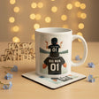 Mug and coaster set with 'Little Man' and 'Big Man' design on a store shelf.