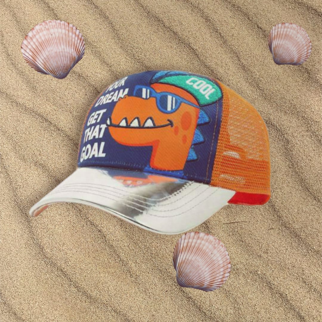 Navy dino kids cap with orange mesh panels, a dinosaur graphic and a grey brim on sand