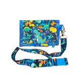 Blue dino trifold wallet with a 3D T-rex patch beside its adjustable printed lanyard