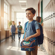 Boy carrying a navy dino sequin insulated lunch bag at school – Jack Gifts Online Lebanon