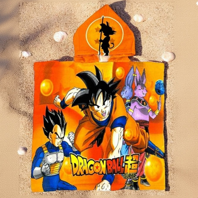 Orange Dragon Ball poncho towel printed with Goku, Vegeta and Beerus flat lay on sand
