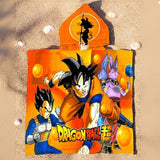Orange Dragon Ball poncho towel printed with Goku, Vegeta and Beerus flat lay on sand