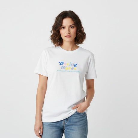 Woman wearing a white tshirt with colorful "During Waves" text on a plain background