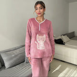 Dusty rose fleece pyjama set with a cream crown cat applique and white piping