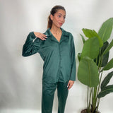 Emerald green velvet PJ shirt with a soft sheen and notch collar, worn with matching pants