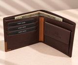 Tan corner trim and a press stud coin purse on an espresso brown bifold, notes behind