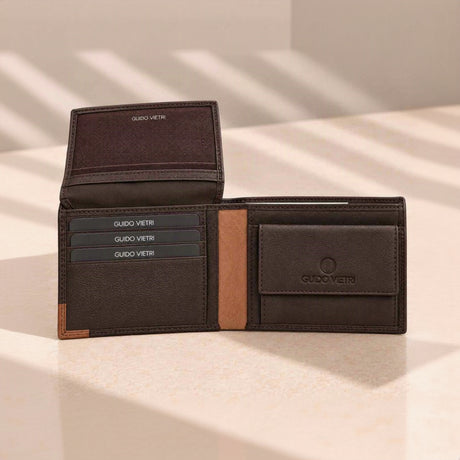 Espresso brown wallet with its flip up card panel raised and a tan leather spine
