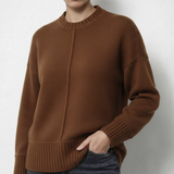 Brown ribbed crew neck wool top, close view of the neckline and cuffs