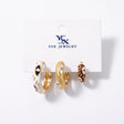 Three evil eye enamel hoop earrings in white, gold and brown in graduated sizes