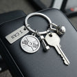 Fitness keychain with weight plate, dumbbell, kettlebell, and an I Can tag