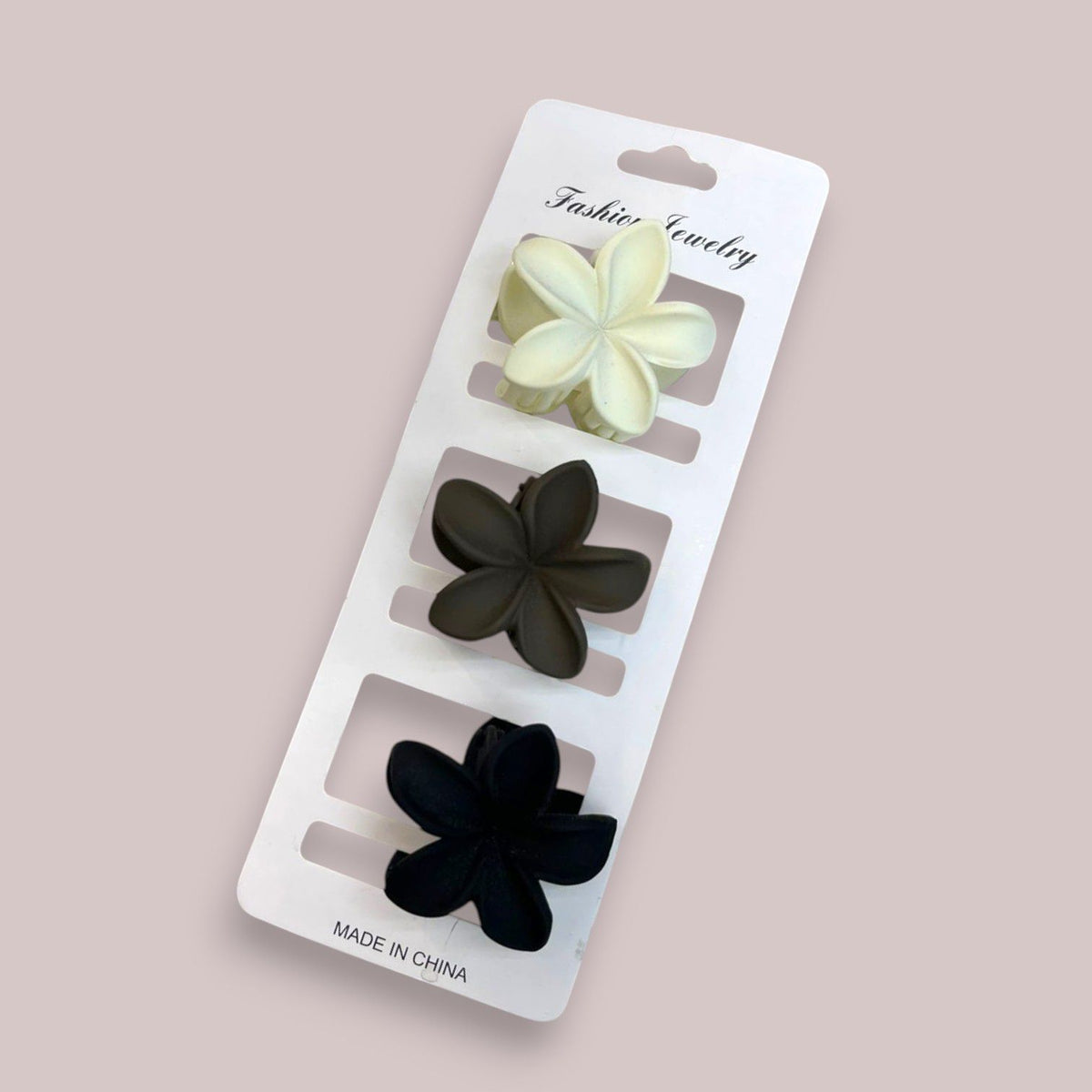 Three matte five petal flower claw clips in cream, olive brown and black for thick hair