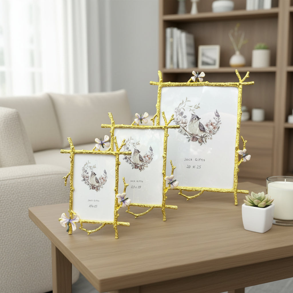 Three gold twig frames with lilac blossoms in relief, sized small, medium and large