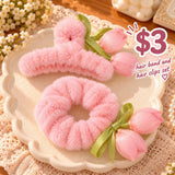 Light pink fluffy claw clip and scrunchie with pink tulip buds and a green ribbon bow