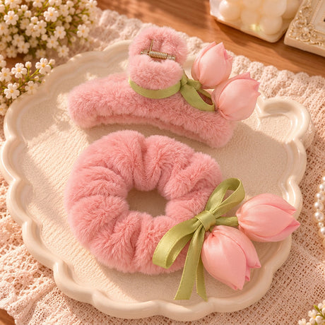 Dusty rose fluffy claw clip with a ribbon wrap and matching scrunchie with tulip buds