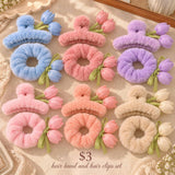 Six fluffy claw clip and scrunchie sets with satin tulip buds in blue, pink, rose, lilac, peach and beige