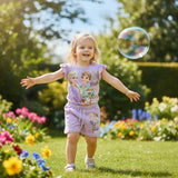 Full length girls purple Frozen Girl Power set worn outdoors in a garden