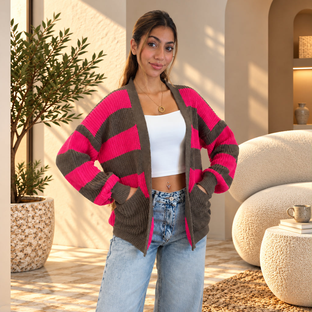 Taupe chunky knit cardigan with wide fuchsia stripes over a white top