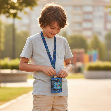 Boy wearing a blue gamer lanyard wallet on a neck strap and opening it outdoors