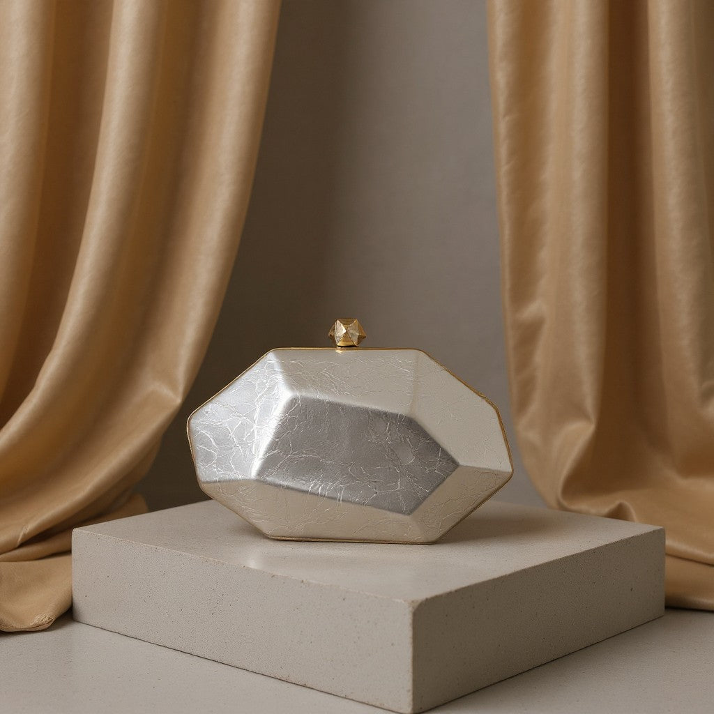 Silver geometric faceted evening clutch