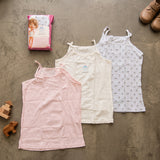 Three girls camisole vests in pink, cream and an all over penguin print