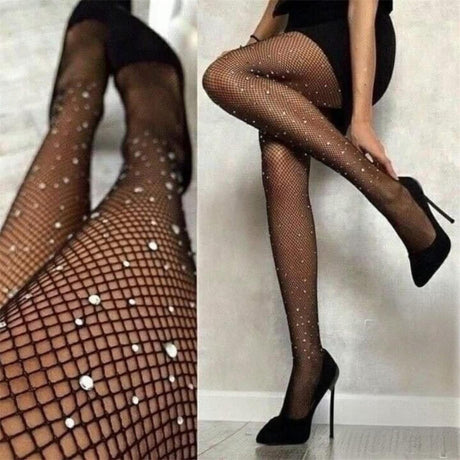 Black fishnet tights adorned with sparkling rhinestones, displayed on a model wearing high heels