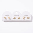 Gold ball studs with a plain bow pair and a crystal pave bow pair on one card