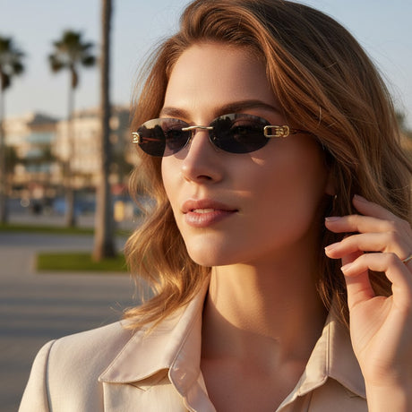 Womens rimless oval sunglasses with dark lenses and gold bracket hardware, Jack Gifts Online Lebanon