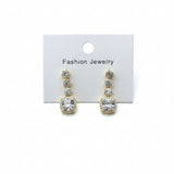 Pair of gold earrings on a 'Fashion Jewelry' card against a white background