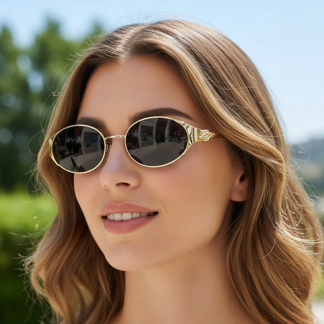 Womens gold oval sunglasses with sculpted temple detail and dark lenses, Jack Gifts Online Lebanon