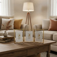 Gold trifold frame with three hinged portrait panels on a rustic wooden coffee table