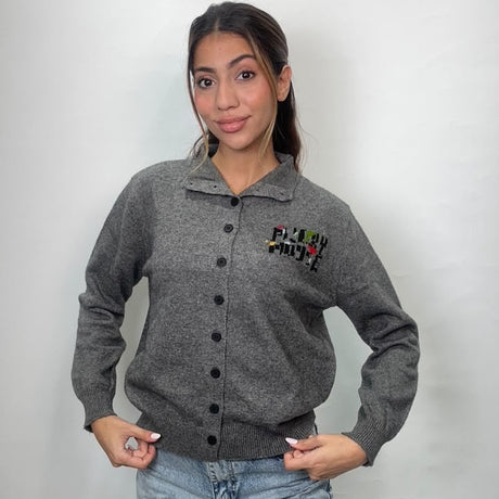 Grey melange knit cardigan with a polo collar, black buttons and a small chest patch