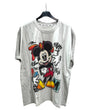 A white oversized tshirt with a colorful graphic of Mickey Mouse on the front