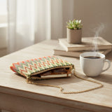 Chevron tapestry bag open on a desk showing the zip top