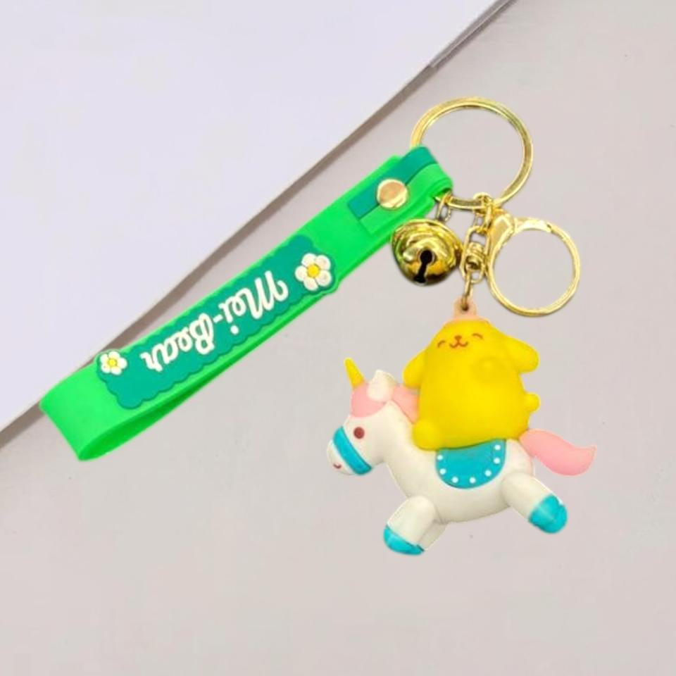 Keychain with a yellow character and a green band featuring 'Mei Bear' on a white background