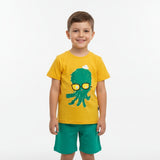 Front view of the mustard octopus graphic tee with glasses print and green shorts