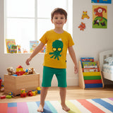 Kids mustard yellow octopus graphic tee with green pajama shorts